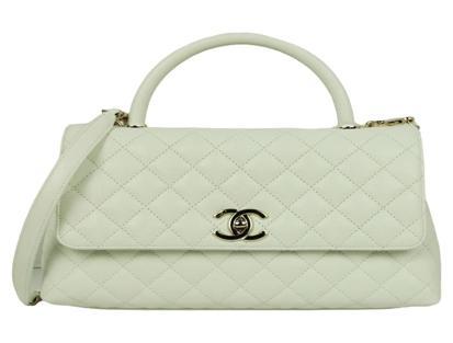 Coco Chanel white leather small quilted flap bag with CC turn-lock closure
